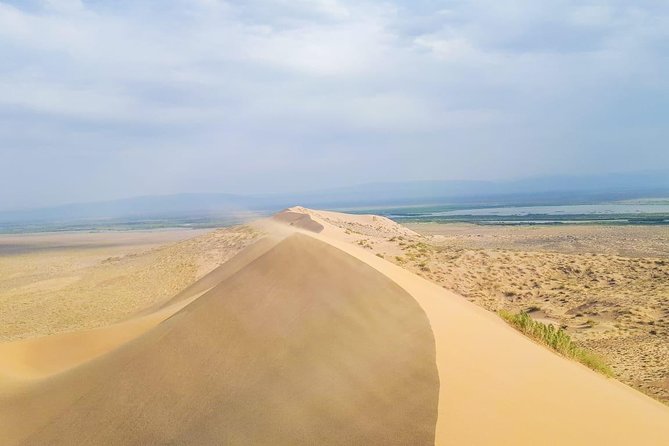 Altyn emel 2 days tour. (Singing dune, AkTau, KattyTau) - The private 4WD makes the long outing easier