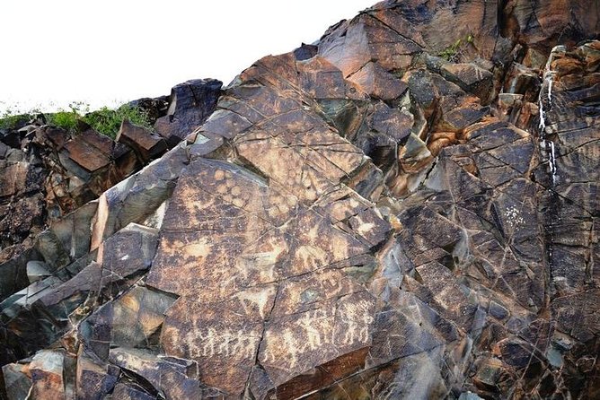Ancient petroglyphs of Tanbaly - UNESCO World Heritage - Sun, walking, and the right level of fitness